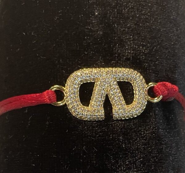 Bracelet Louis Vuitton et fil rouge I42LH-BX